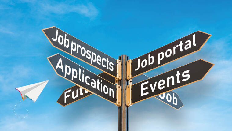 Signpost with offers of the Career Point in front of a blue sky with a paper plane.