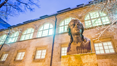 Schiller bust in front of university's main building